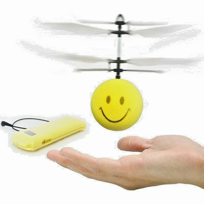 Mini Copter Toy Smile Flying Ball Flyer Hand Controlled Helicopter