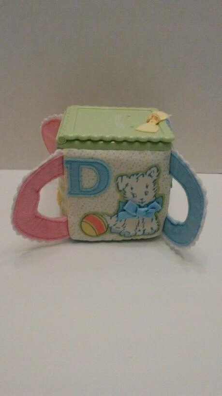 Curva de aprendizaje Amy Coe ABC Pop Up Bunny Rattle Foto 4 de 4