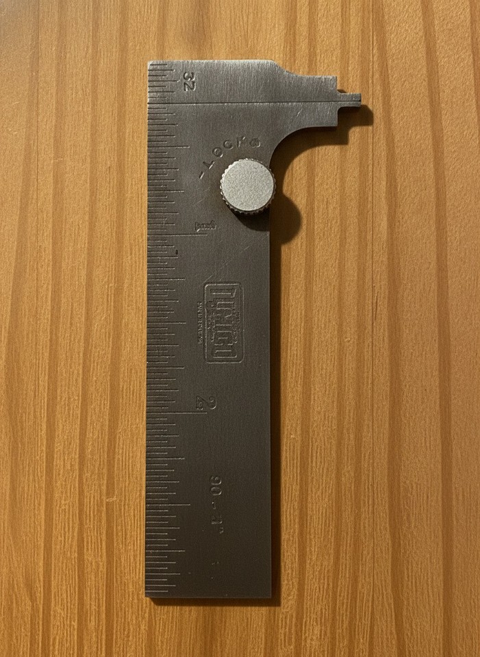 A USA-made Tumico pocket slide caliper in steel — a beautifully precise machinist's tool from an era when American manufacturing was king, compact enough to pocket or display.