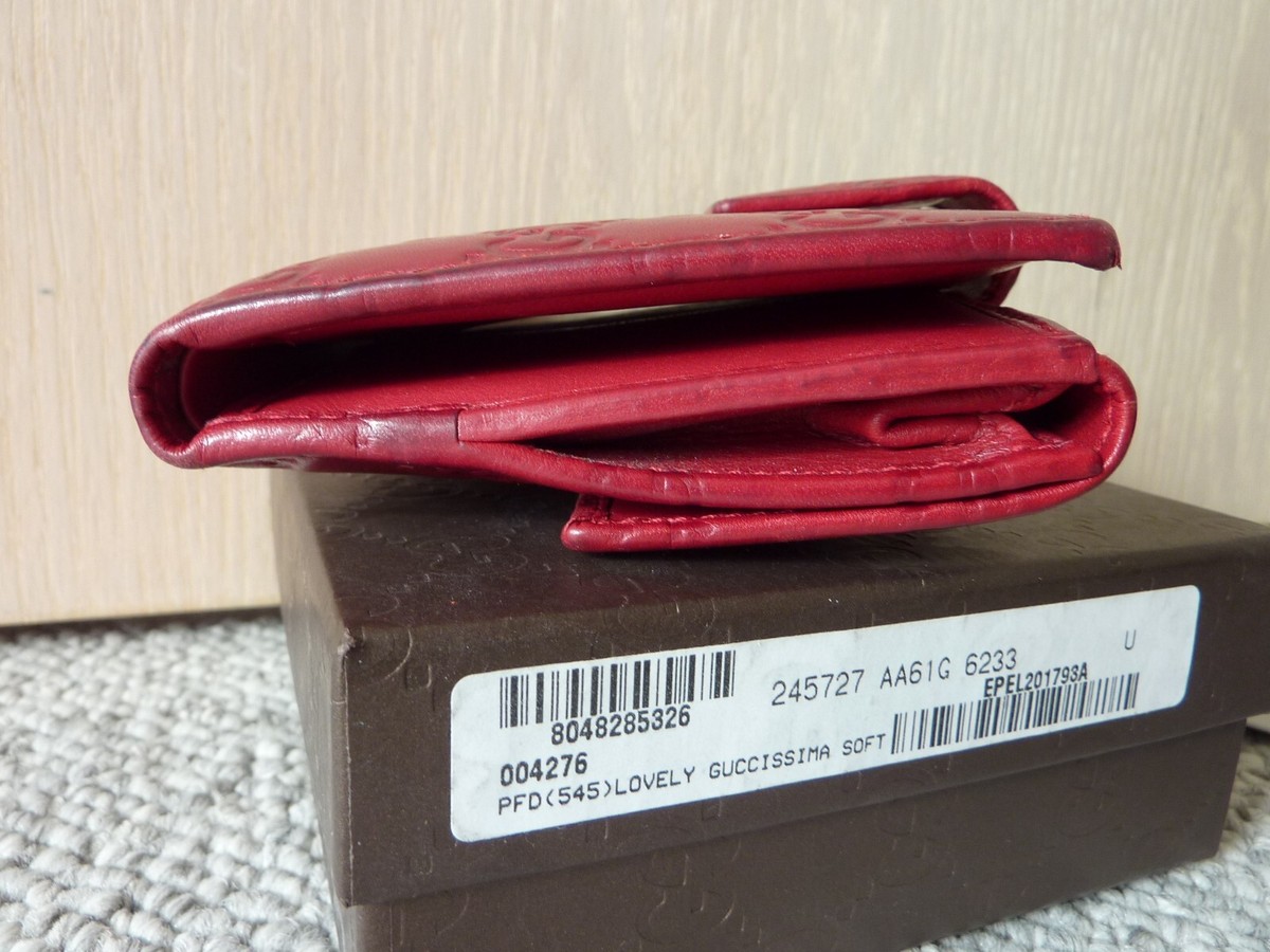 $525 GUCCI Red leather French flap Wallet Hearts detail $525 GUCCI Red leather French flap Wallet Hearts detail