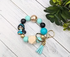 Arabian Princess Cartoon With Silicone Charm Wristlet 7.5" Stretch  With Tassel