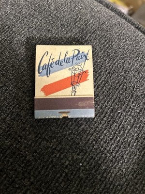 Cafe De La Paix St Moritz Hotel Central Park NYC Vintage Matchbook Front Strike