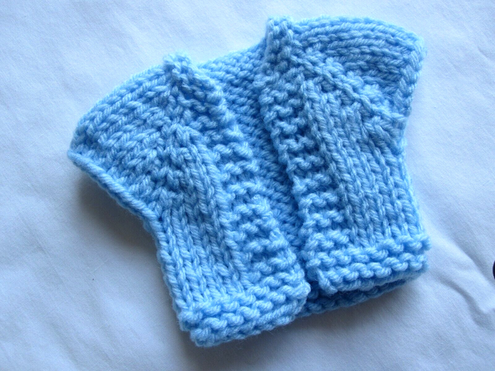 Three sweaters for 14 inch dolls such as Wellie Wisher and Ruby Red