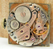 Vintage Harman 17 jewel men's wrist watch movement with dial, hands and crown