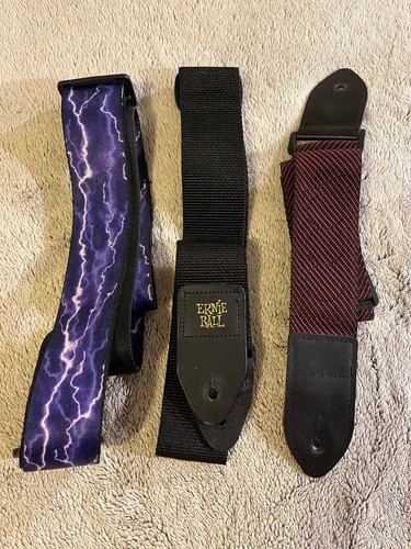 Lot of 3 guitar straps strap. USED but still work fine.