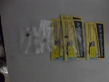 lot of 4 slot car pinion gears, 15 tooth, 64 pitch.