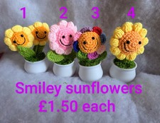 A Selection of Crochet Flowers In Pots.