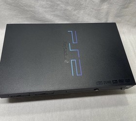 PlayStation 2 W/20 Games , Wireless Controller & Cords . (Tested & Working)