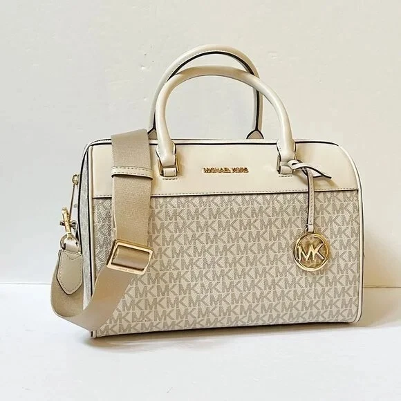 Bolso de viaje mediano Michael Kors MK Jet Set en crema claro Foto 2 de 4