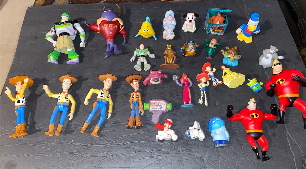 Disney PVC Figure Lot of 48 Toys Aladdin, Monsters Inc Toy Story