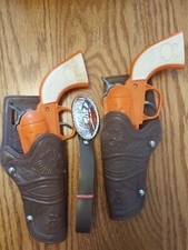 Legends of the Wild West - 2 Orange Toy Cap Gun Revolvers-Belt Excel Condition