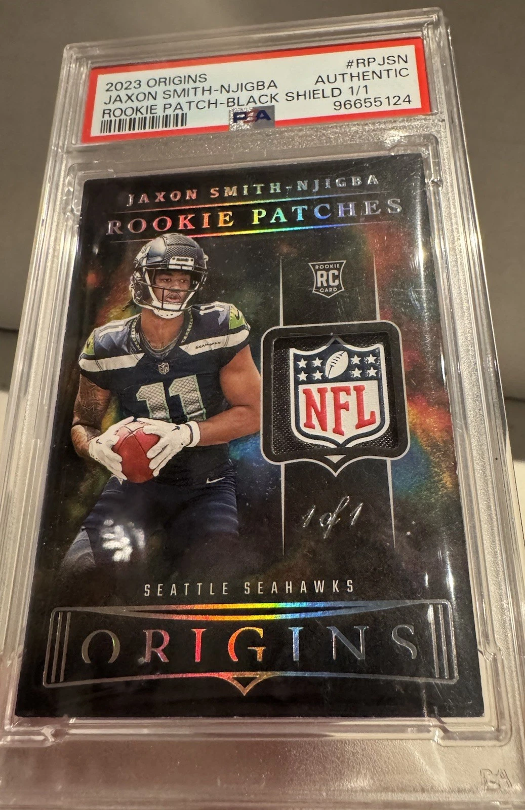 Jaxon Smith-Njigba Panini Origins Rookie Patches #RPJSN Black NFL Shield 1/1