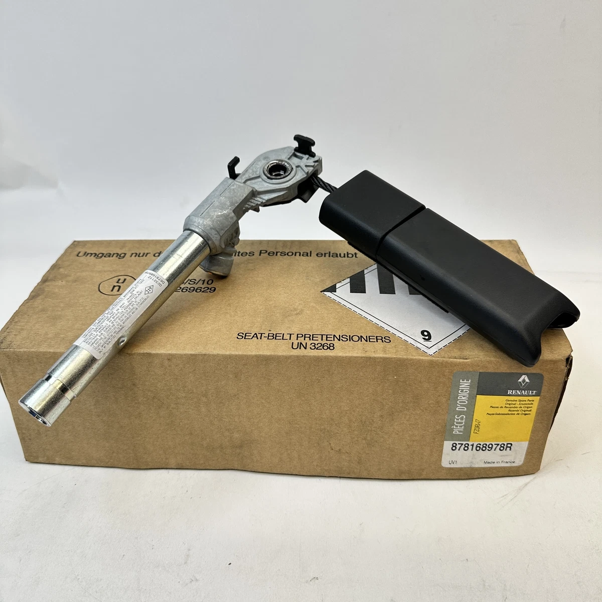 Belt pretensioner clearance