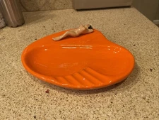 Bright orange ceramic nude lady ashtray with heart-shaped tray cigarette rest