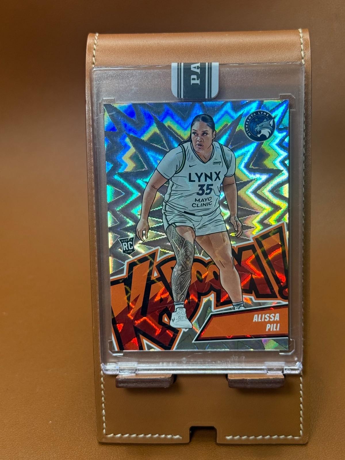 Alissa Pili 2024 Panini Rookie Royalty WNBA #12 Kaboom Insert SP RC Lynx Encased