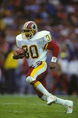 Brian Mitchell Washington Reskins runs with the ball during a NFL - Old Photo