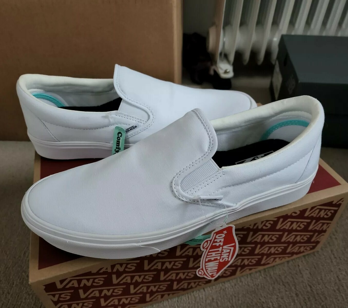 comfycush white slip on vans