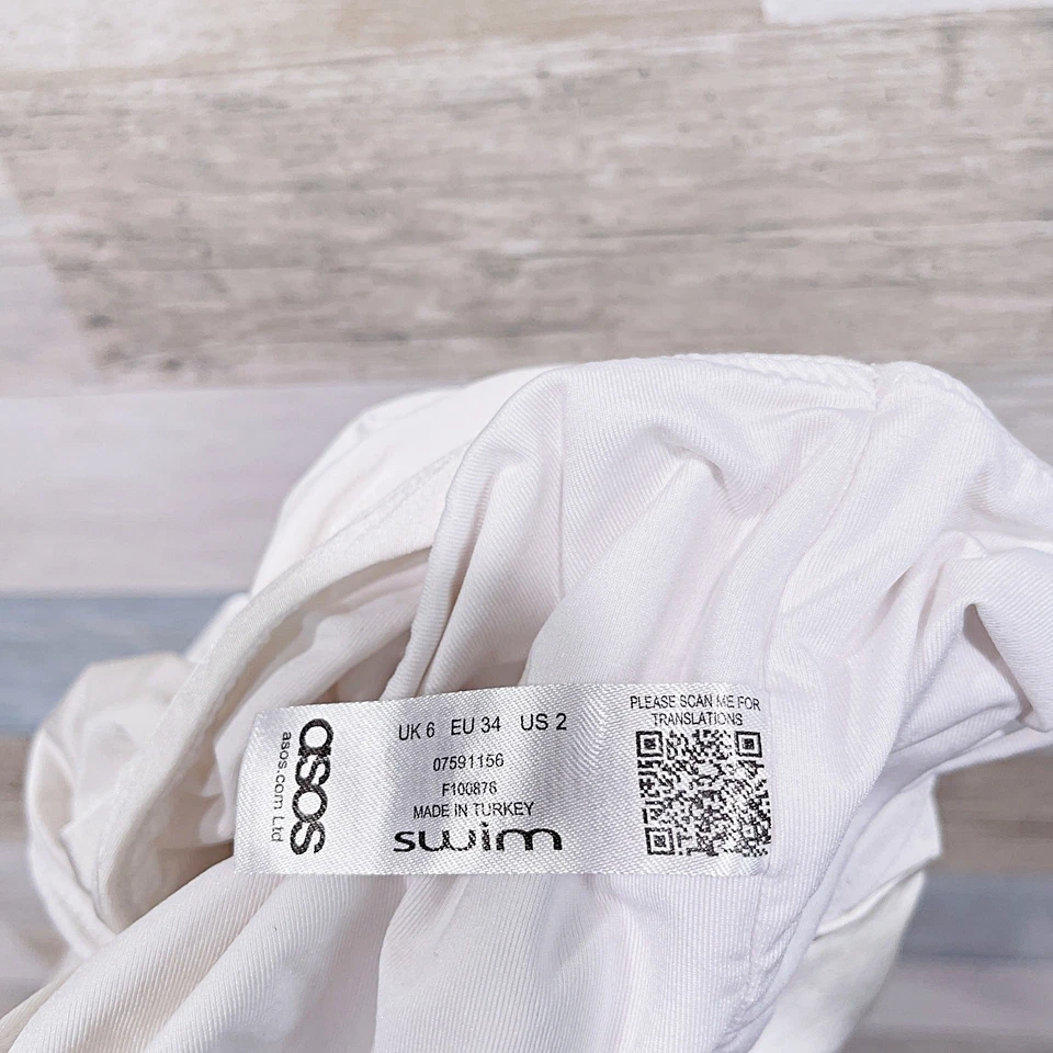 Top de bikini blanco para mujer ASOS manga gorra de natación torcida delantera EE. UU. 2 UK 6 Foto 3 de 4