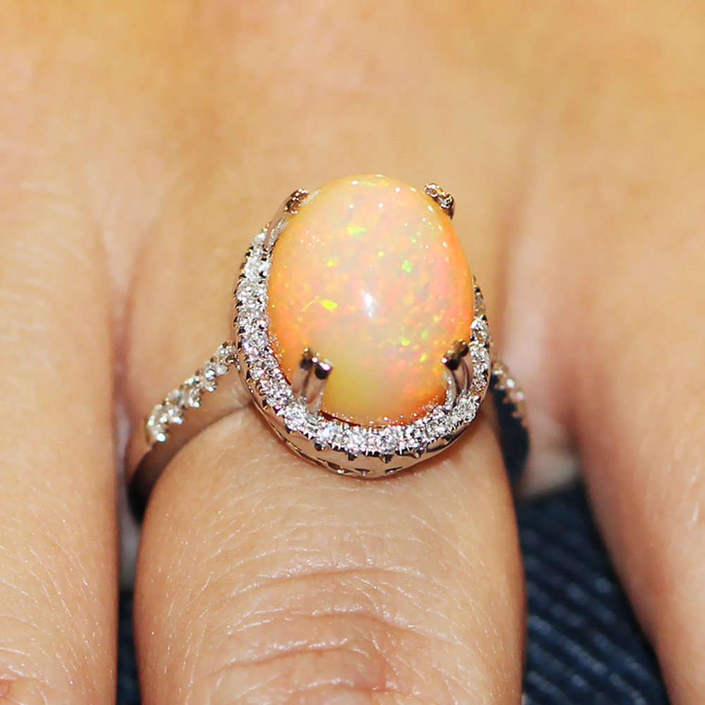 Oval Opal Halo Ring with Diamonds in 18kt White Gold