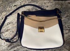 GUESS Vintage Purse. Blue And White With A Tan Flap with Gold Decorative Chain.