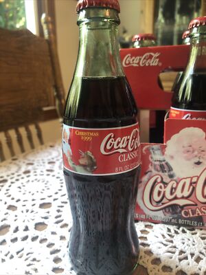 COCA COLA VINTAGE CHRISTMAS SANTA PACK 1999- 6 PACK- 8OZ BOTTLES COCA COLA VINTAGE CHRISTMAS SANTA PACK 1999- 6 PACK- 8OZ BOTTLES
