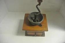 Primitive hand made coffee grinder