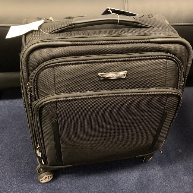 spinner boarding bag