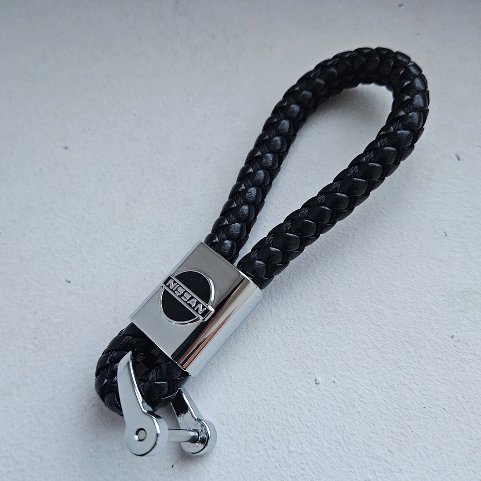 Porte clé Nissan neuf sous blister cuir corde tresser - Photo 2/2