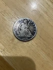 1877s Seated liberty half dollar