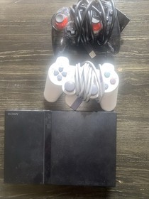 Sony PlayStation 2 Slim With Controllers And Games