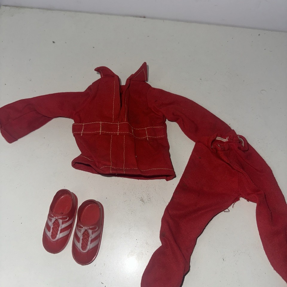 Original 1975 Kenner Six Million Dollar Man figure with the red outfit — pure 70s nostalgia fuel for the guy who grew up bionic.