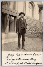 Well Dressed Man Standing Outside Brick Building, With Hat, Sweden RPPC Postcard