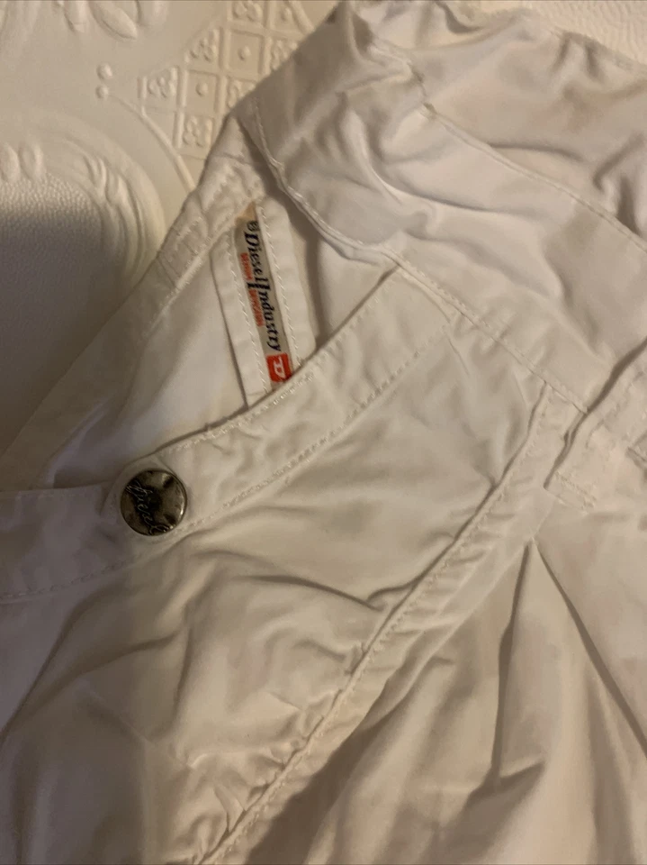 Falda y corta Diesel de segunda mano para niña talla 4 y 5 Foto 3 de 4