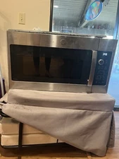 GE (JVM6175SKSS) 1.7 cu. ft. Over the Range Microwave with Sensor Cook In Stainl