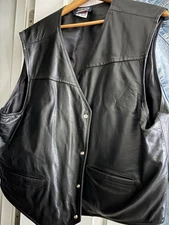 NRA Conceal carry vest.  Black Leather. Worn Once. Excellent Condition.  XL