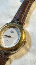 ladies 32mm Timex 2toned quartz indiglo RUNS for PARTS,, needs buckle, as shown