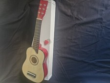 Childs wooden toy  guitar with plectrum 