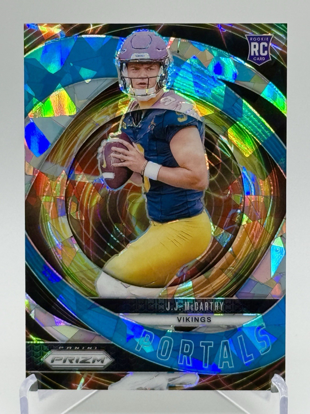 2024 Panini Prizm  J.J. McCarthy Portals Blue Cracked Ice Rookie Vikings RC /99