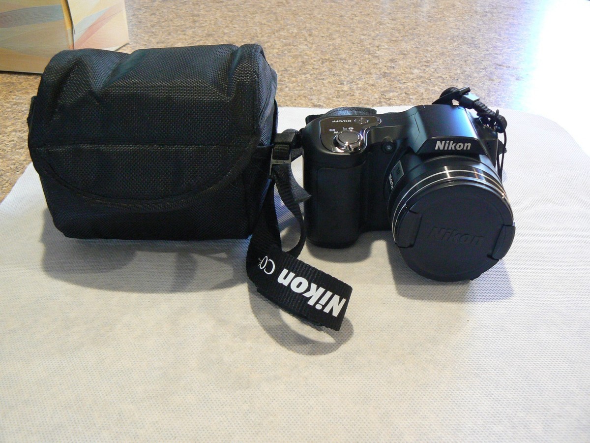 Nikon Coolpix L100 10MP 15X Zoom Digital Camera with Cap & Bag