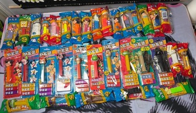 Lot of PEZ Dispensers. 33 Total. Still In Packaging New. Never Used