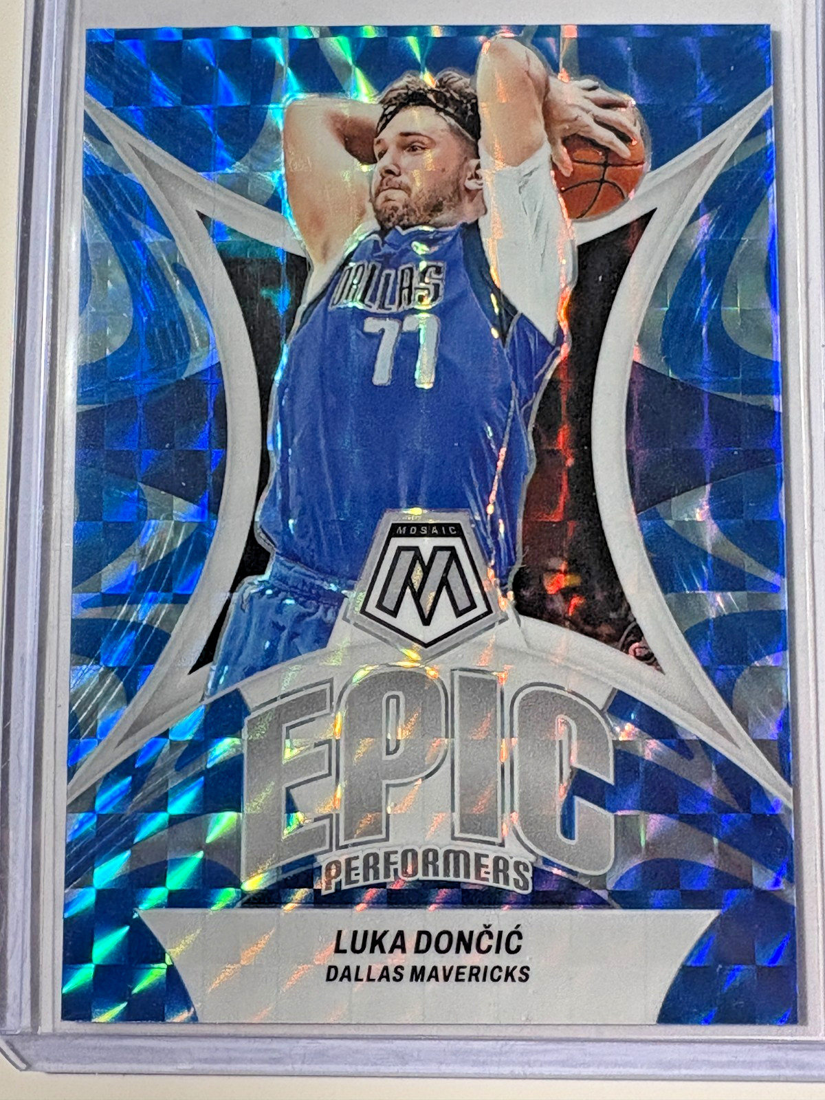 Luka Doncic 2023-24 Panini Mosaic Epic Performers Reactive Blue #9 31/99
