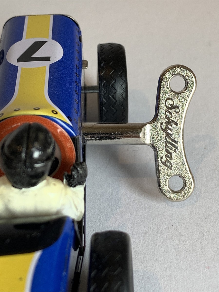 Speedway Auto Racer game, classic tin cars race around track as it Speedway Auto Racer game, classic tin cars race around track as it