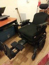 Quantum QM-710 Power Wheelchair Black Adjustable Footrests Elevating Legrest