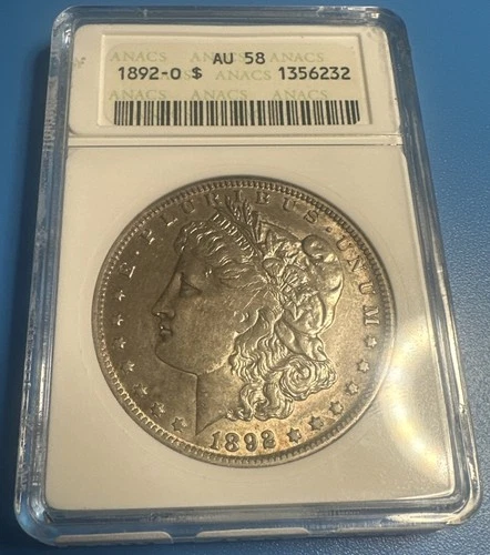 1892-O Morgan Silver Dollar AU58 ANACS Soapbox (M6233)