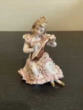 Vtg PORCELAIN FIGURINE PINK RUFFLED DRESS WOMAN PLAYING MUSICAL INSTRUMENT 4.5”