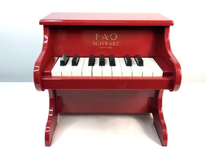 FAO SCHWARZ UPRIGHT CHILDS PIANO. PRE-OWNED AND WORKING.