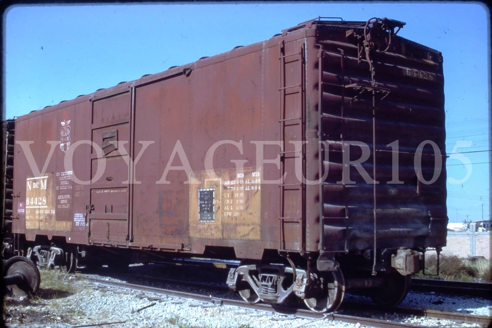 Original train slide N de M Nacionales de México boxcar 64428, 1985 - Image 1 of 1