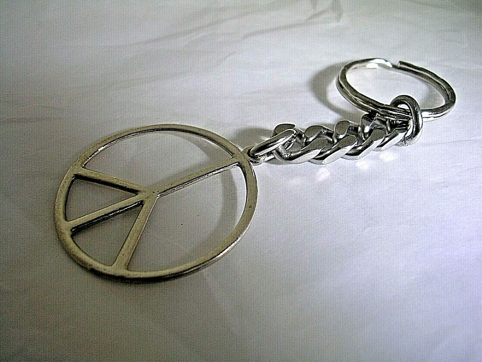 PEACE SIGN KEY CHAIN WITH A HIGH POLISHED FINISH IN STAINLESS STEEL. | eBay