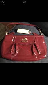 red patent leather clutch purse