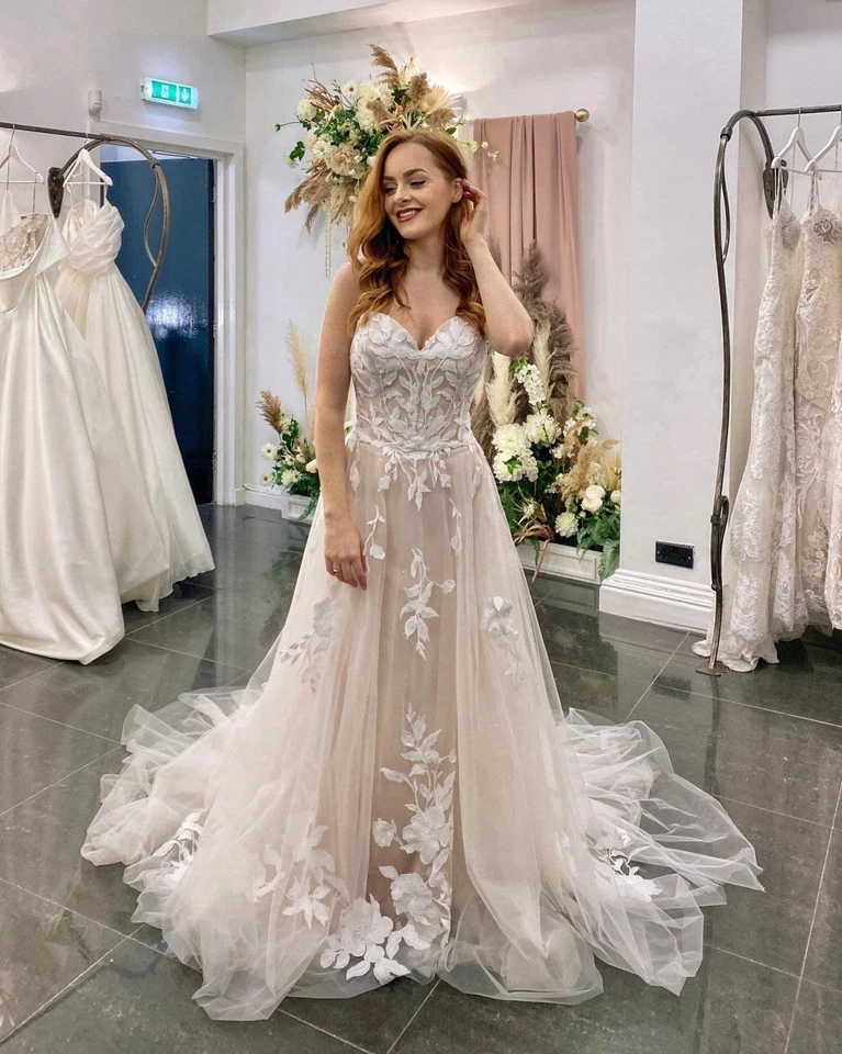 Vestidos de novia champán cuello en V apliques de encaje línea A tren de barrido vestido de novia Foto 2 de 4